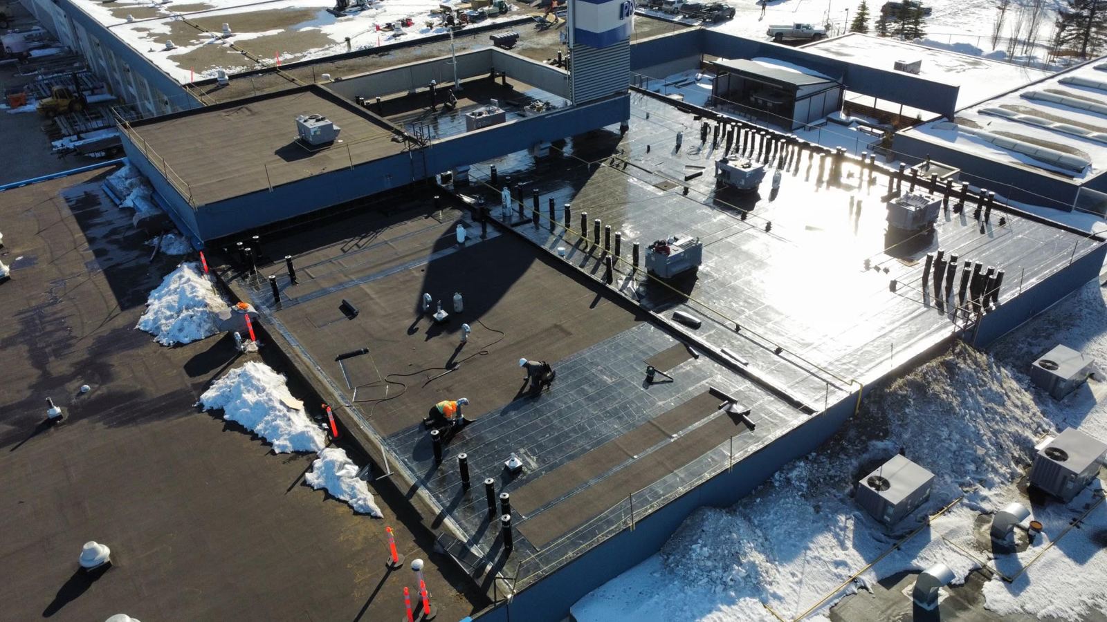 Commercial complex roof in winter