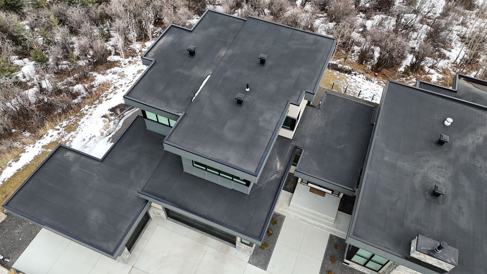 Drone view of a modern home flat roof