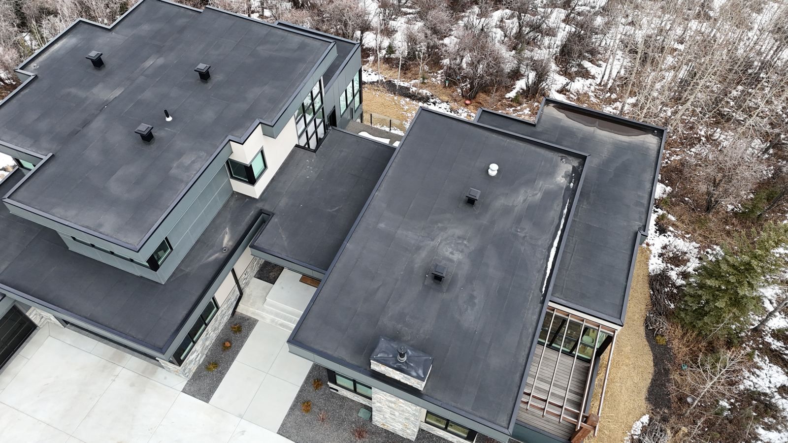 Flat roofs on a modern home after the install