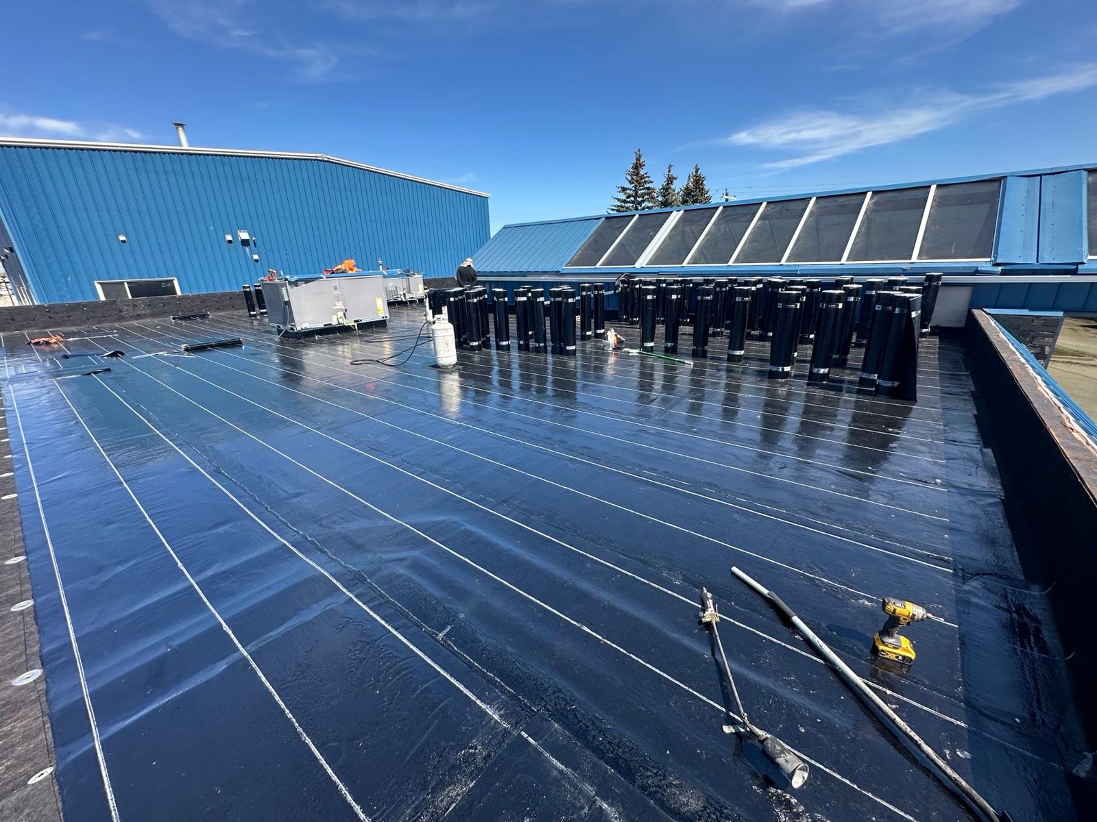 Close-up of fresh torch-on membrane on a commercial roof