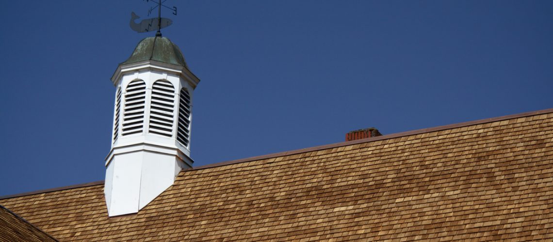 pristine cedar shake roofing on antiquited architectural cupola building